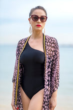 Load image into Gallery viewer, Front view of the Sacha pink and black leopard print kaftan for women in Dubai, sustainably made in Bali
