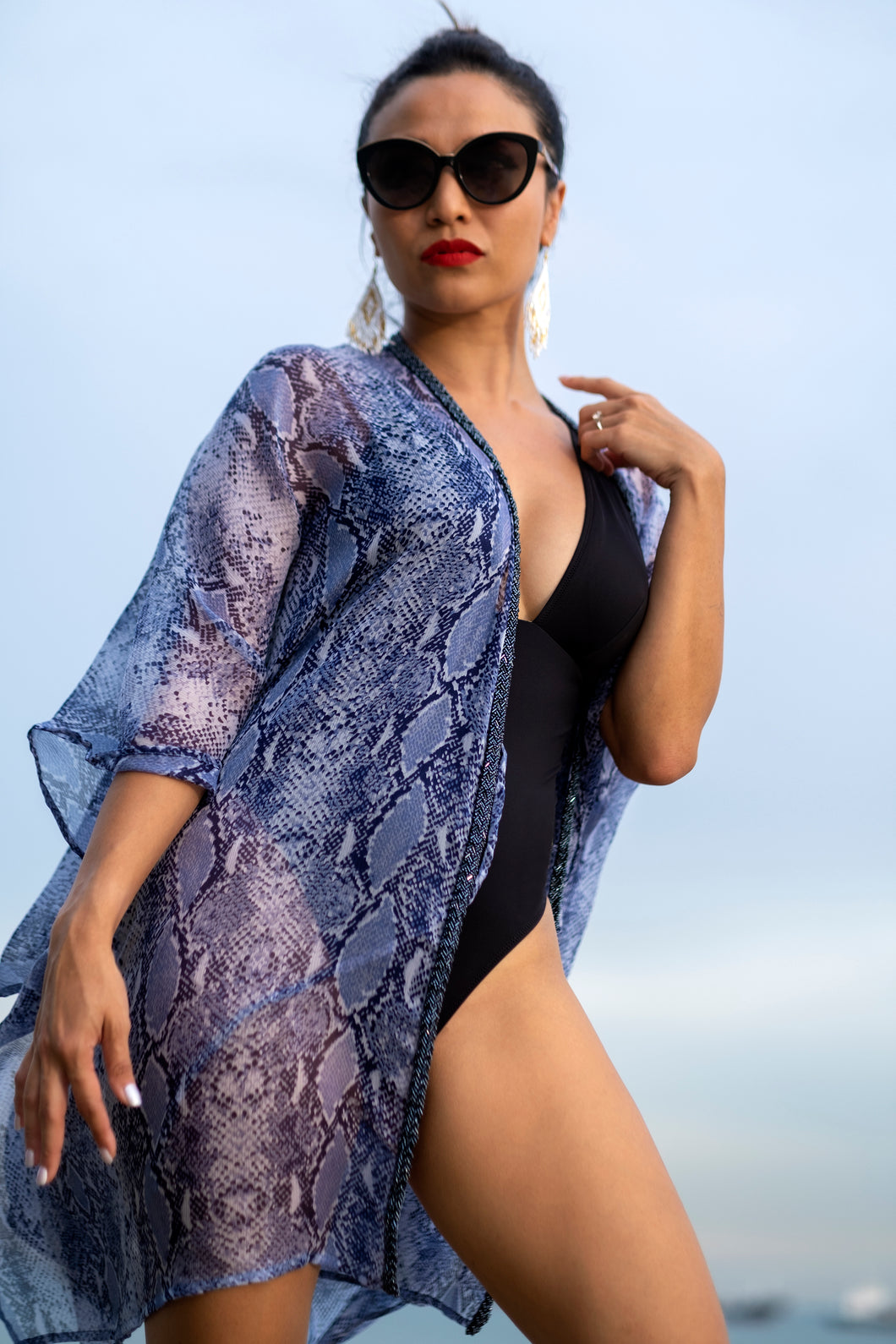 Sahila lightweight crepe chiffon beach kaftan with a snake print design, one size fits most, modern kaftan style with hand sewn bead neckline trim for a glamorous touch, perfect for Dubai holidays & beach days
