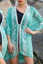 Load image into Gallery viewer, Stylish Xandra beach kaftan cover up with shimmering silver sequin details, sustainable resort kaftan made in Bali for women in Dubai looking for where to buy beach kaftans online
