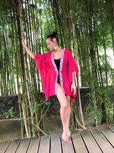 Load image into Gallery viewer, Women&#39;s rose pink chiffon beach kaftan with Indonesian batik trim – perfect beach cover-up in Dubai
