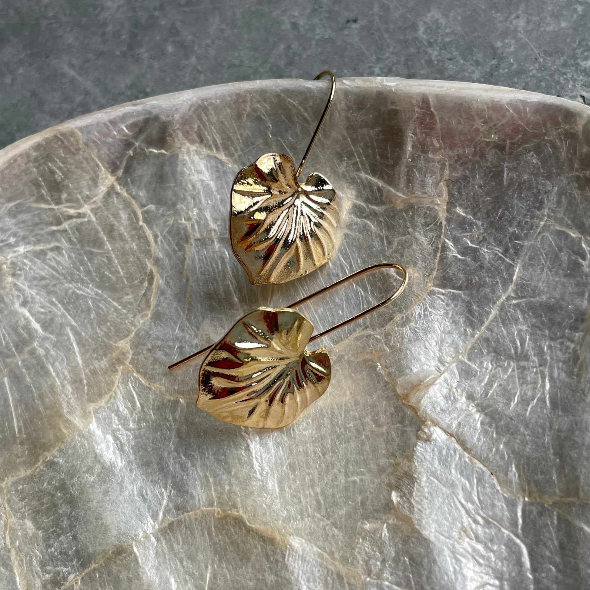 Feminine gold leaf earrings made from alloy, ideal for stylish women in the UAE
