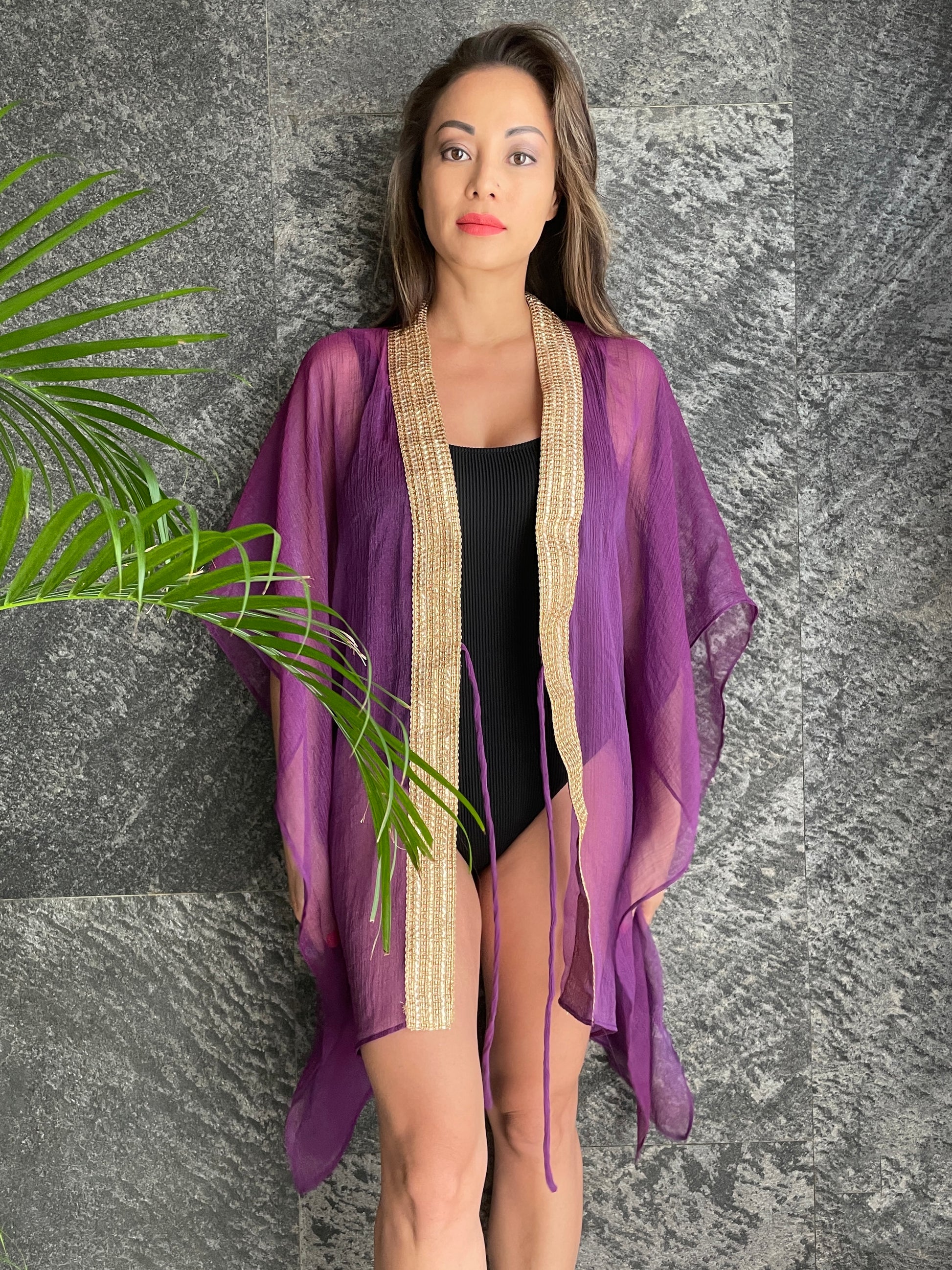 Flowy orchid purple kaftan dress, perfect for Dubai resorts & beach holidays
