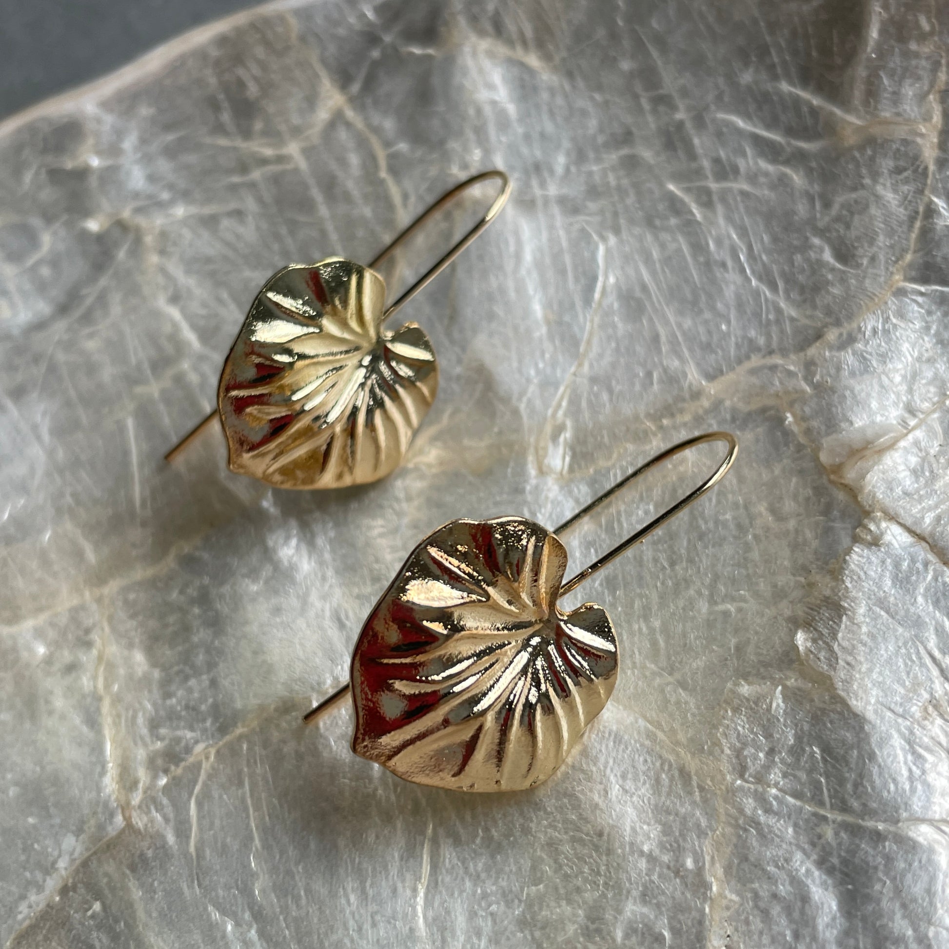 Elegant gold leaf earrings for Dubai women who love timeless, nature-inspired jewelry
