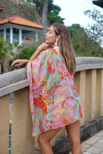 Load image into Gallery viewer, Statement resort kaftan in colorful geometric print with Pucci-inspired vibrant floral chiffon, for women with bold style looking for unique and luxury beach kaftans in Dubai