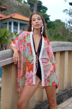 Load image into Gallery viewer, Statement resort kaftan in colorful Pucci inspired floral print in flowy chiffon and hand sewn bead trim, for women in Dubai looking for unique modern beach kaftans in dubai
