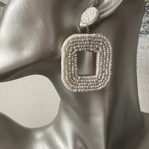 Yelia handmade beaded bold coloured statement dangle earrings in white