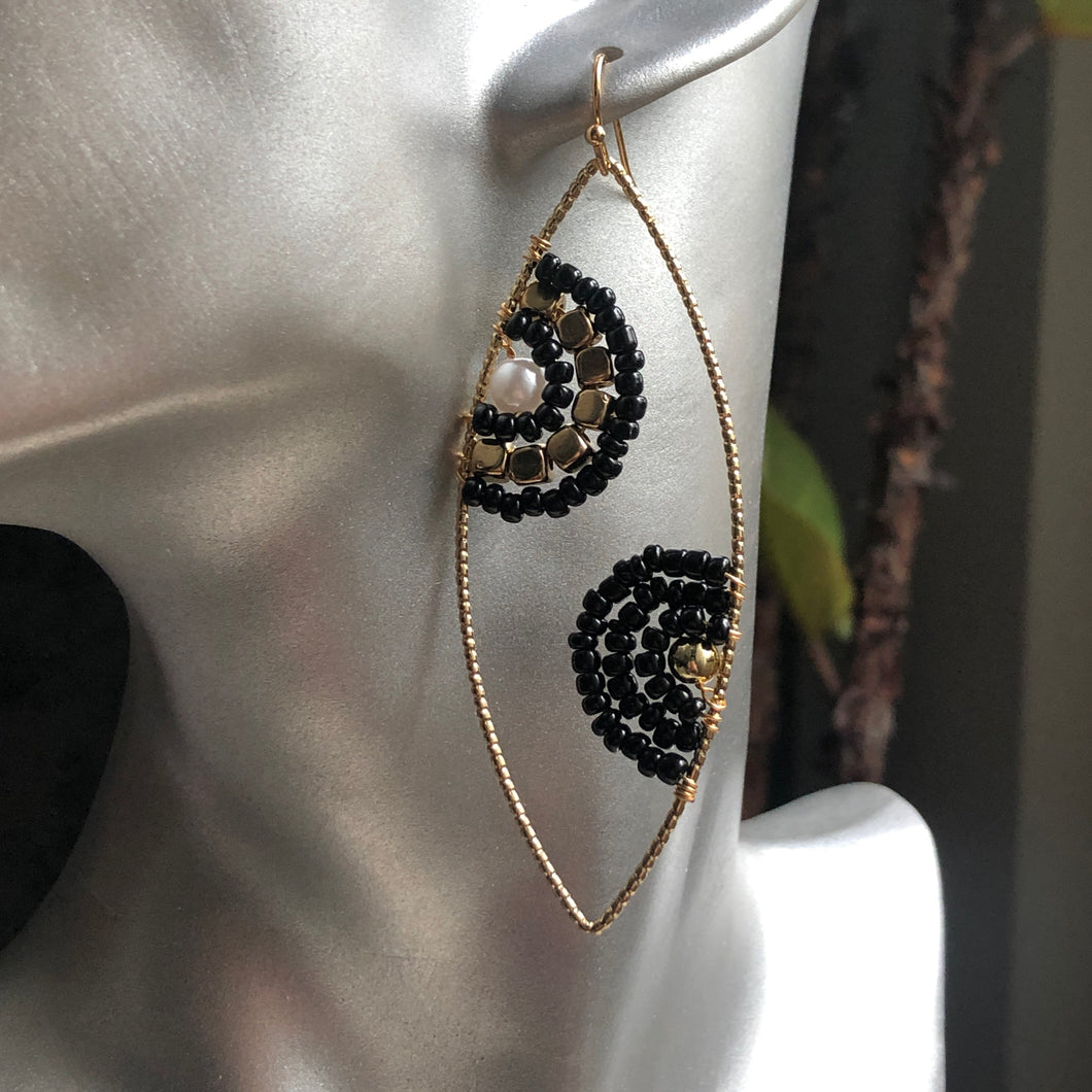 Cateri boho chic handmade hand-beaded dangle earrings in black and gold