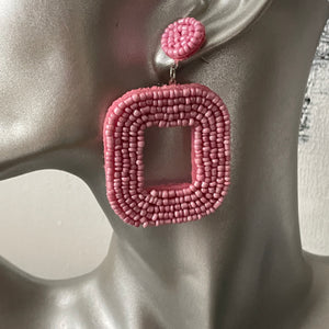 Yelia handmade beaded bold coloured statement dangle earrings in pink