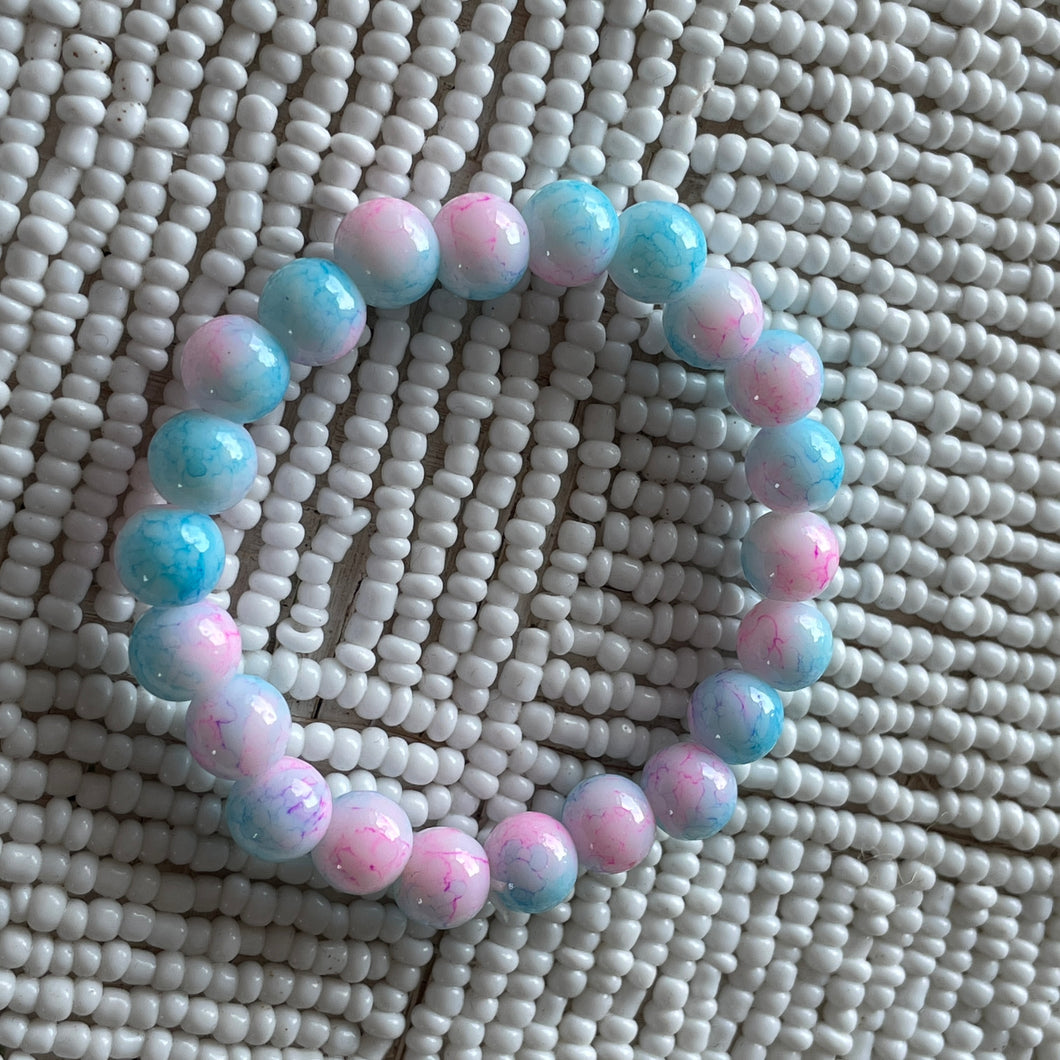 Helmi Kids' Glass Beaded Bracelet in Light Blue on Pink