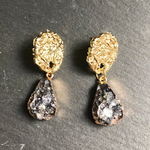 Istas natural druzy crystal earrings with textured gold pin and gold accents in black