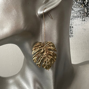 Vana boho chic glamorous tropical gold monstera leaf dangle earrings