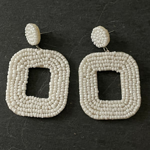 Yelia handmade beaded bold coloured statement dangle earrings in white