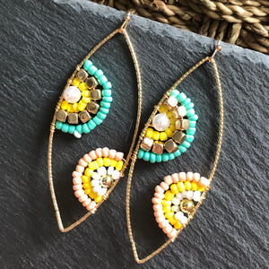 Cateri boho chic handmade hand-beaded dangle earrings in peach and green