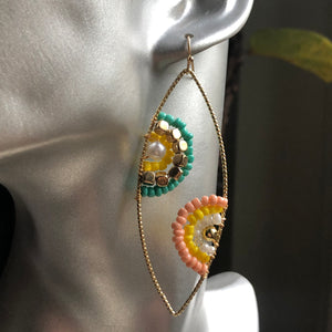 Cateri boho chic handmade hand-beaded dangle earrings in peach and green