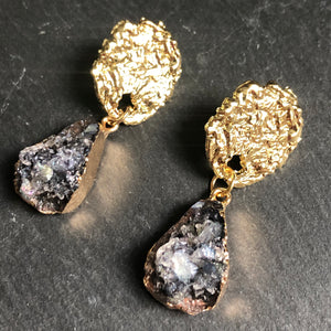 Istas natural druzy crystal earrings with textured gold pin and gold accents in black