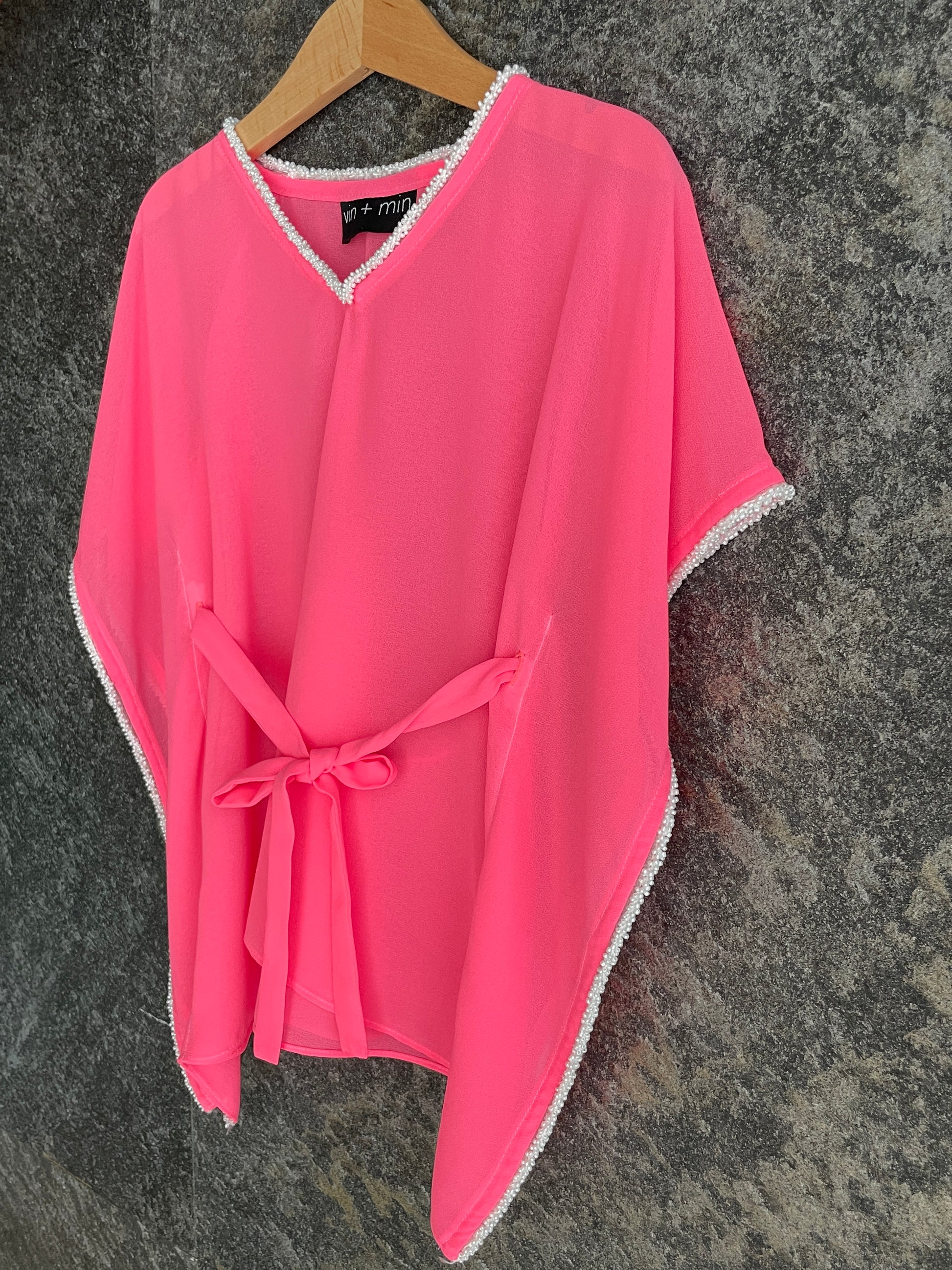 Lightweight chiffon kids beach dress in neon pink with pearly bead trim, handmade in Bali