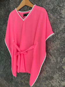Lightweight chiffon kids beach dress in neon pink with pearly bead trim, handmade in Bali