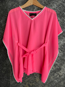 Handmade neon pink kids kaftan with pearl bead neckline, perfect beachwear for girls in Dubai