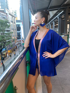 Layal petite women's kaftan in lightweight royal blue chiffon, styled as a resort style cover-up for city adventures wherever life takes you!
