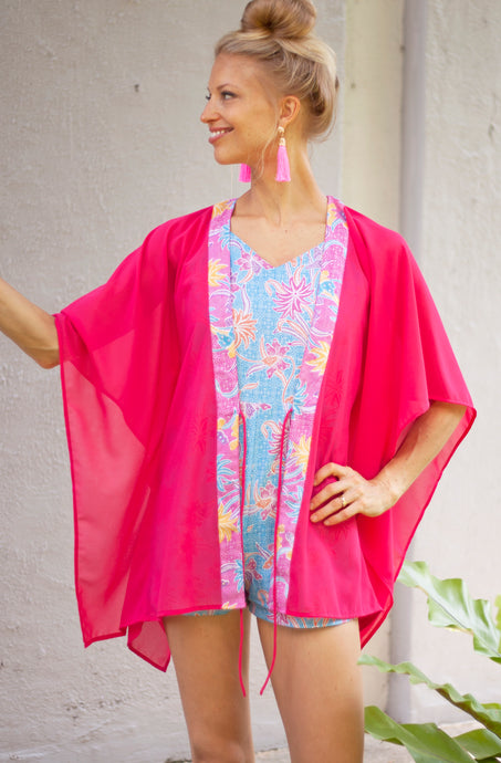 Lestari rose pink batik-trim beach kaftan for women with lightweight chiffon fabric and artisanal Indonesian hand-stamped batik trimmed along its neckline, for women in Dubai
