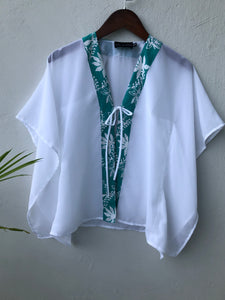 Bali-made children's beach cover-up in shimmering lurex chiffon with vibrant green batik trim, for girls in Dubai

