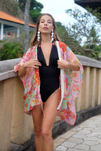 Load image into Gallery viewer, Stylish and flowy swimsuit cover-up for women in Dubai in a Pucci-inspired floral chiffon with hand sewn details, sustainably made in Bali for women in Dubai

