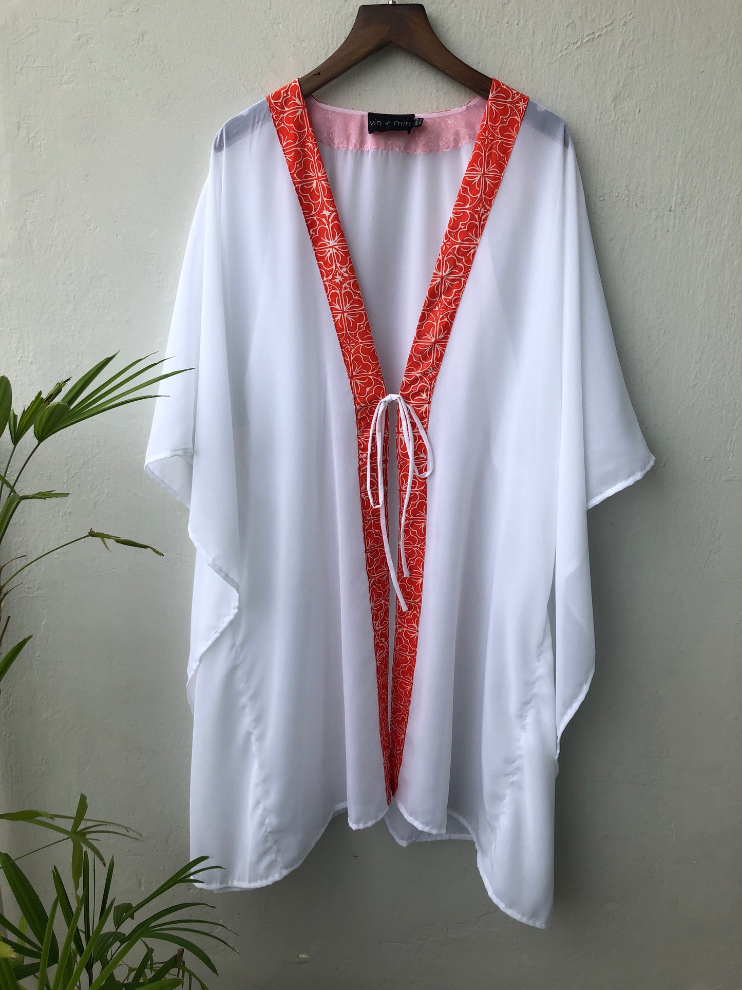 Sheer white lurex chiffon kaftan with artisanal batik trim – sustainable beachwear for women in Dubai
