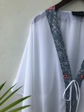 Load image into Gallery viewer, From our Onism collection, a white lurex chiffon batik trimmed womens beach kaftan for sale in Dubai, sustainable resort wear from Bali