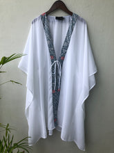 Load image into Gallery viewer, Dubai resort fashion, the Onism lightweight chiffon beach kaftan with artisanal floral batik print from Indonesia, sustainable beachwear for women looking for the best beach kaftans in Dubai