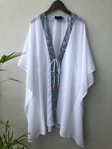 Dubai resort fashion, the Onism lightweight chiffon beach kaftan with artisanal floral batik print from Indonesia, sustainable beachwear for women looking for the best beach kaftans in Dubai