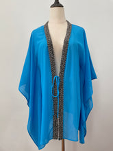 Load image into Gallery viewer, Hand-sewn beaded beach cover-up in blue – perfect for poolside glam in Dubai and beyond
