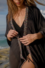 Load image into Gallery viewer, Sofi black beach kaftan with hand-sewn bead trim, flowy crepe chiffon
from Bali, for sale in dubai