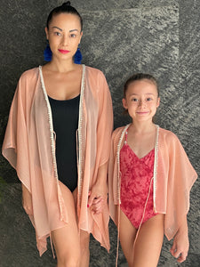 Ula kaftan cover-up in textured chiffon, perfect for Dubai beach vacations
in mommy and me set