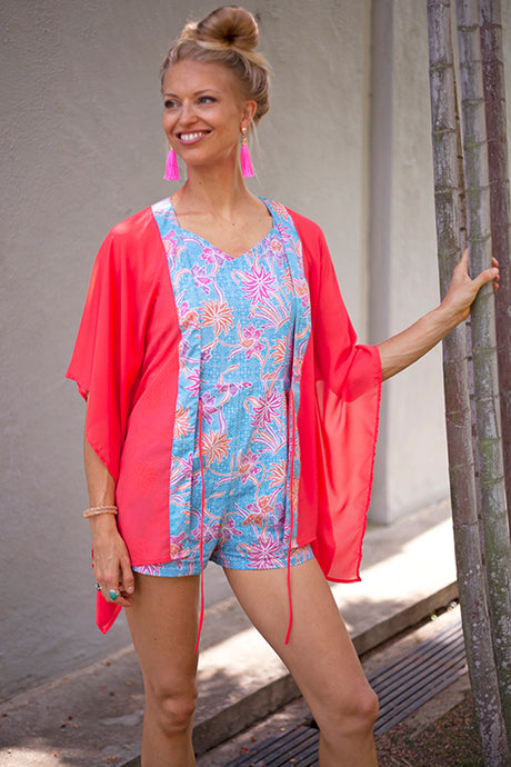 Ikura orange chiffon Utama women's kaftan with artisan batik trim for Dubai resort wear