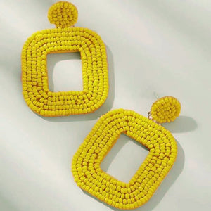 Yelia handmade beaded bold coloured statement dangle earrings in yellow